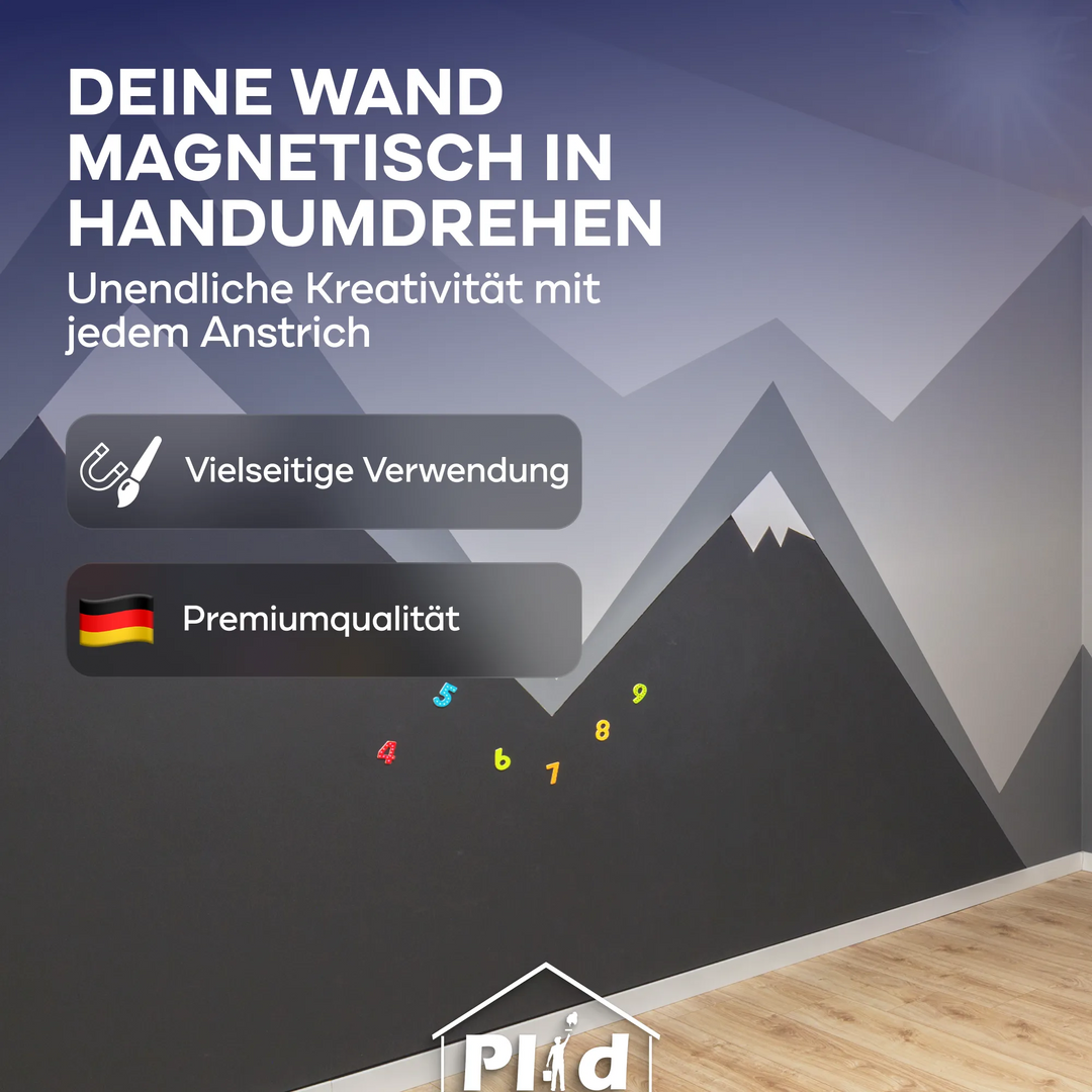 Eine Wand mit einem Bergmotiv und bunten Zahlen, gemalt mit plid Magnetfarbe - haftstark &amp; überstreichbar für viele Oberflächen. Der deutsche Text und das Flaggensymbol empfehlen die Verwendung als Memoboard. Schafft einen magnetischen, hellen, kreativen Raum.