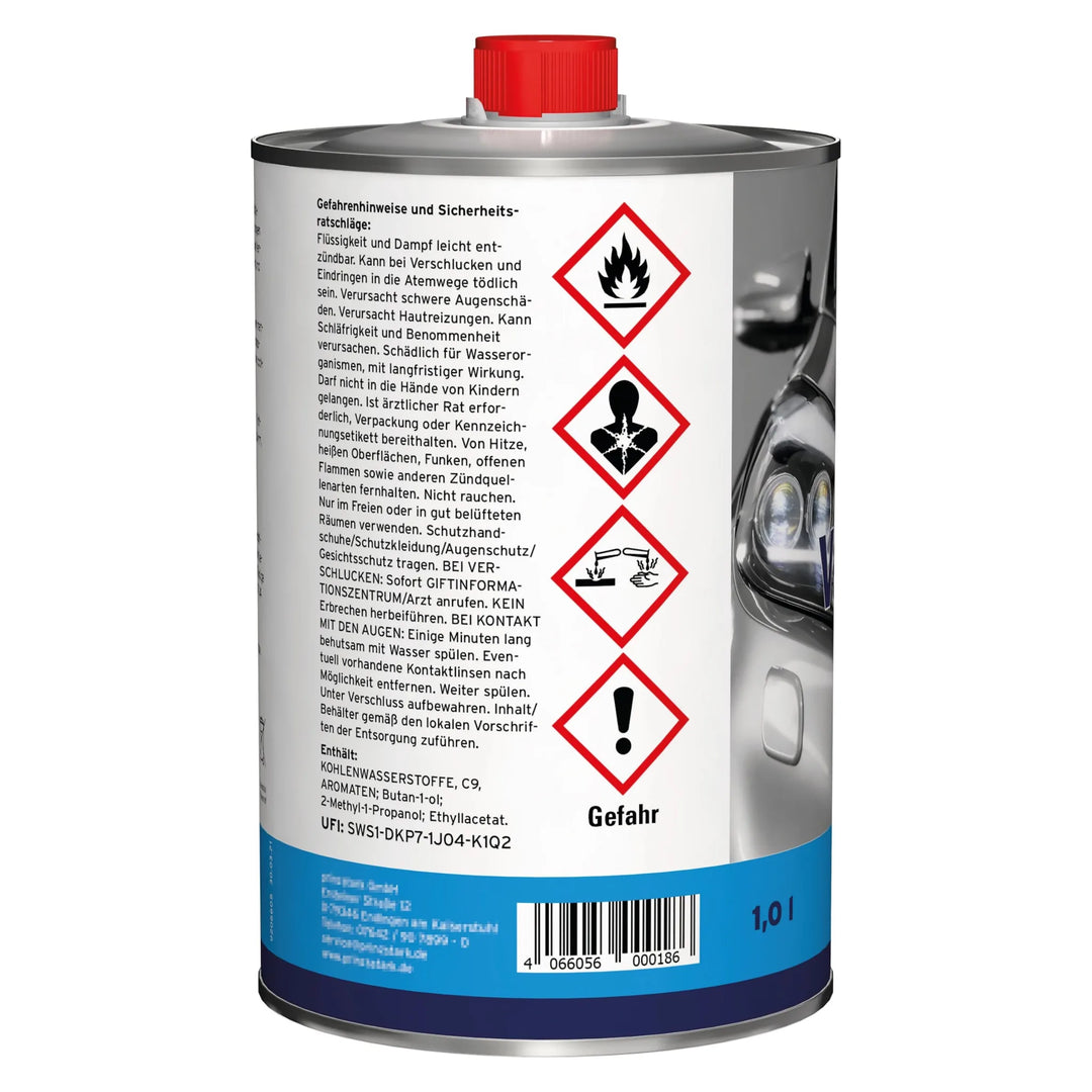 Ein 1-Liter-Metallbehälter mit roter Kappe, gekennzeichnet mit Symbolen für Entflammbarkeit, Toxizität, Gesundheitsgefährdung und Umweltgefahren. Das Etikett zeigt einen Teil eines Autoscheinwerfers; der deutsche Text bezeichnet es als plid Plid Nitro-Verdünner - stark &amp; schnell.