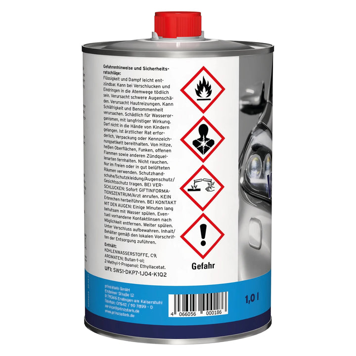 Ein 1-Liter-Metallbehälter mit roter Kappe, gekennzeichnet mit Symbolen für Entflammbarkeit, Toxizität, Gesundheitsgefährdung und Umweltgefahren. Das Etikett zeigt einen Teil eines Autoscheinwerfers; der deutsche Text bezeichnet es als plid Plid Nitro-Verdünner - stark &amp; schnell.